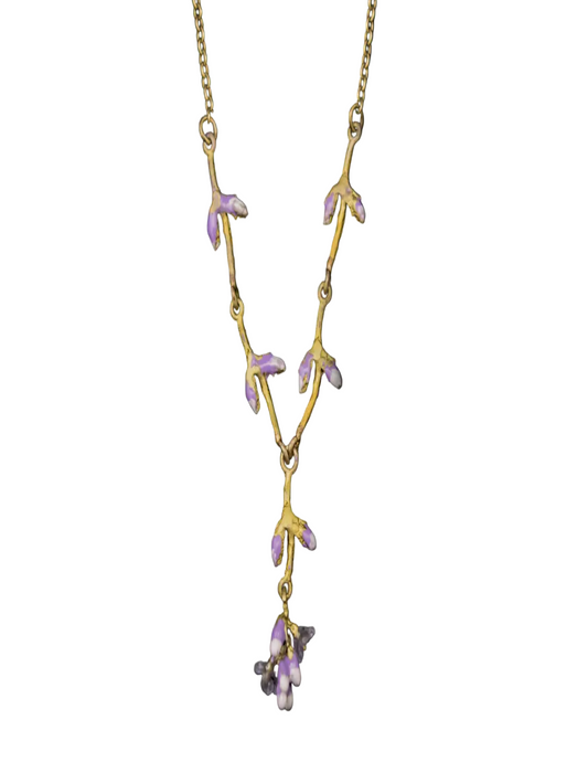 Gold necklace with purple gemstones on a black background